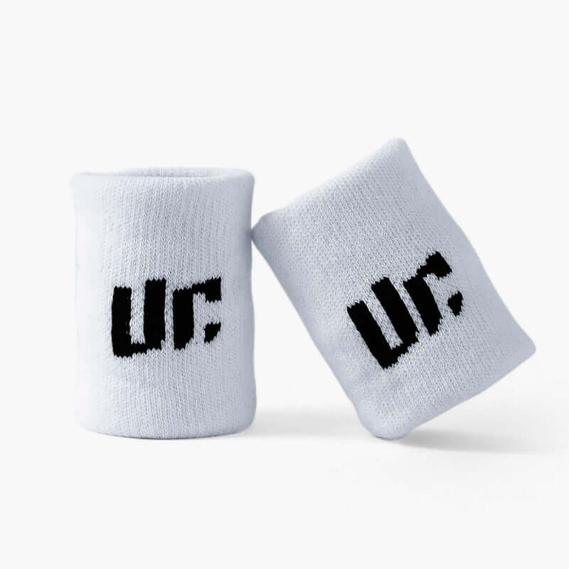 Dos muñequeras marca urcih blancas con logo negro
